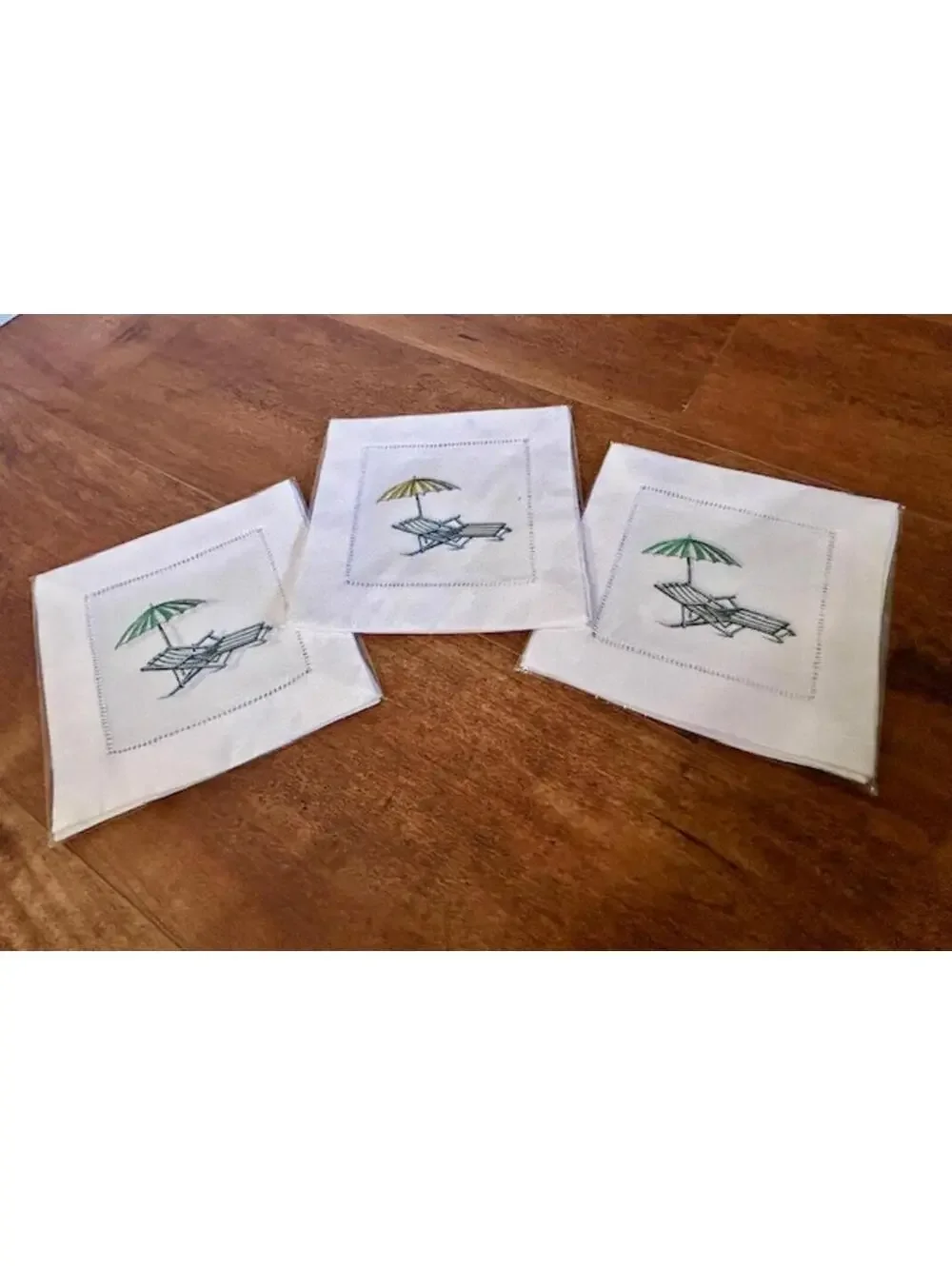 Set of 3 White Cloth Napkins with Beach Chair and Umbrella Embroidery